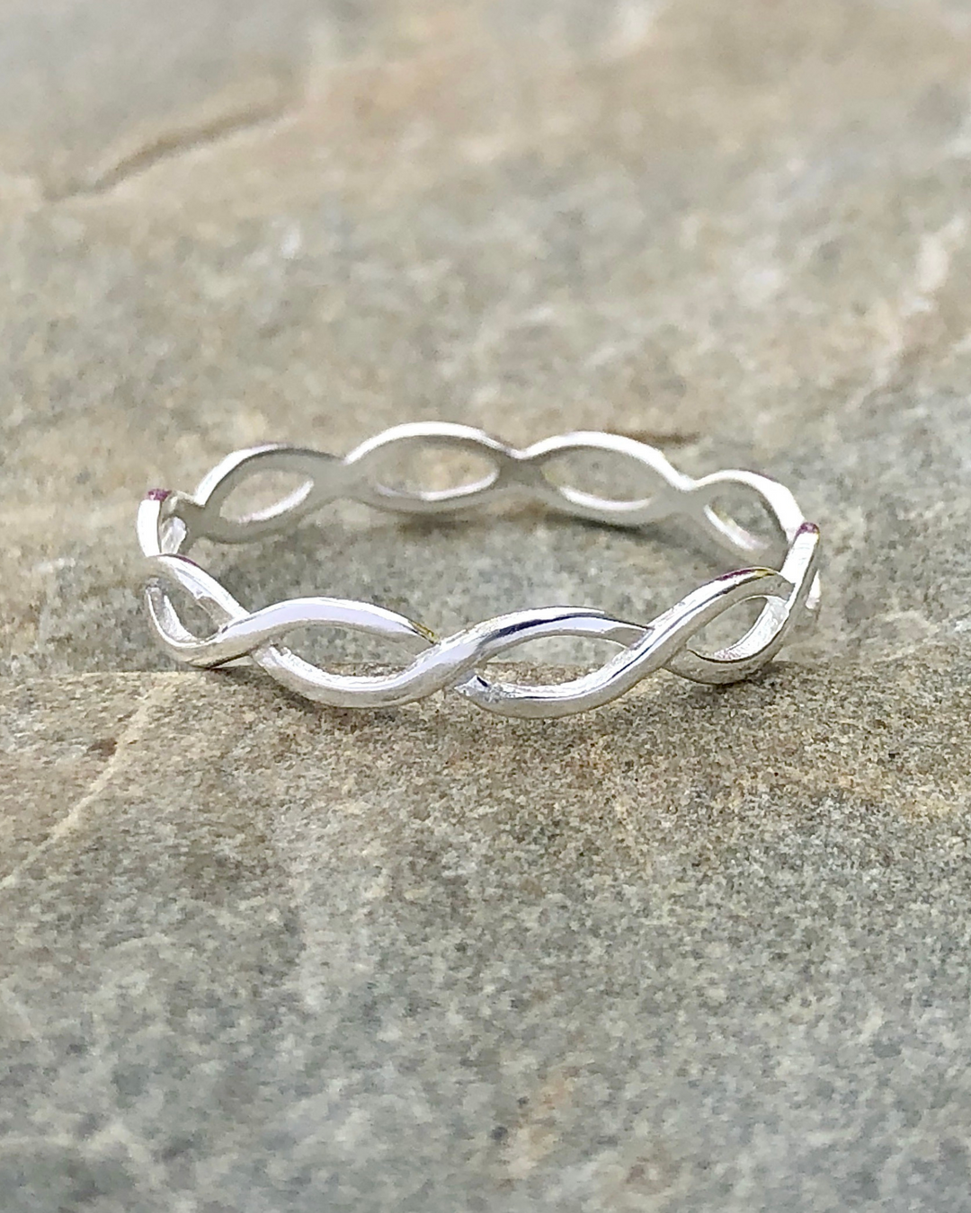 Sterling Silver Braid Ring.  This delicate ring encircles your finger with a lovely braid.  Measures approximately 1/8" H or 3mm