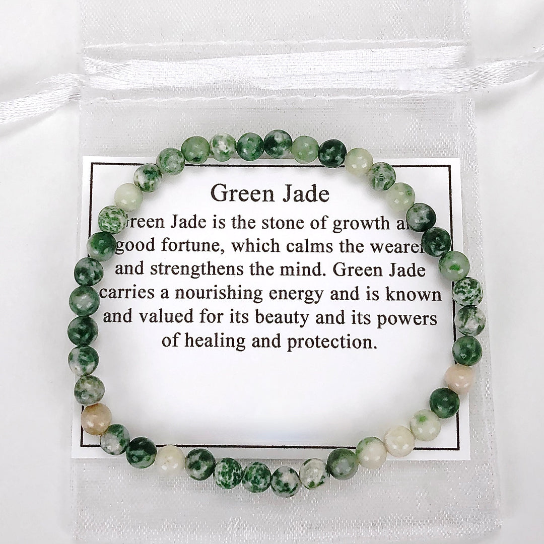 Children's Natural Green Jade 4mm Gemstone Bracelet with a description card