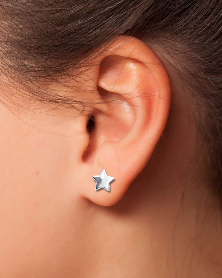 Sterling Silver Large Star Stud Earring on ear