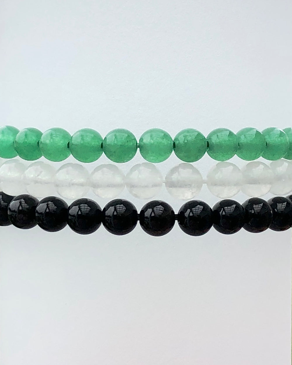 Aventurine, Snow Quartz and Black Agate Gemstone Bracelets.