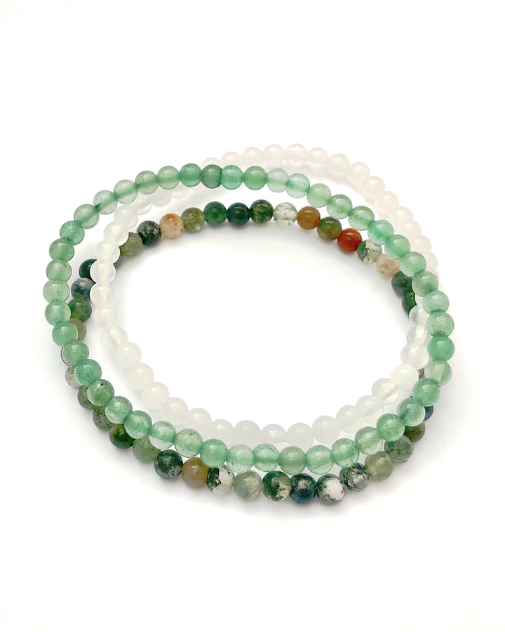 Support and Grounding 4mm Beaded Gemstone Bracelet Set with Aventurine, Snow Quartz and Indian Agate on a white background