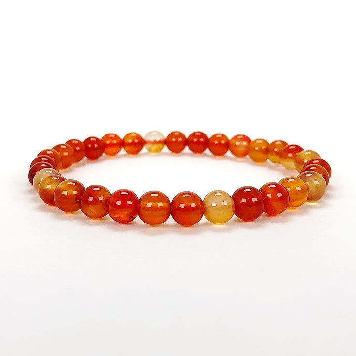 Carnelian 6mm Beaded Gemstone Bracelet on a white background.