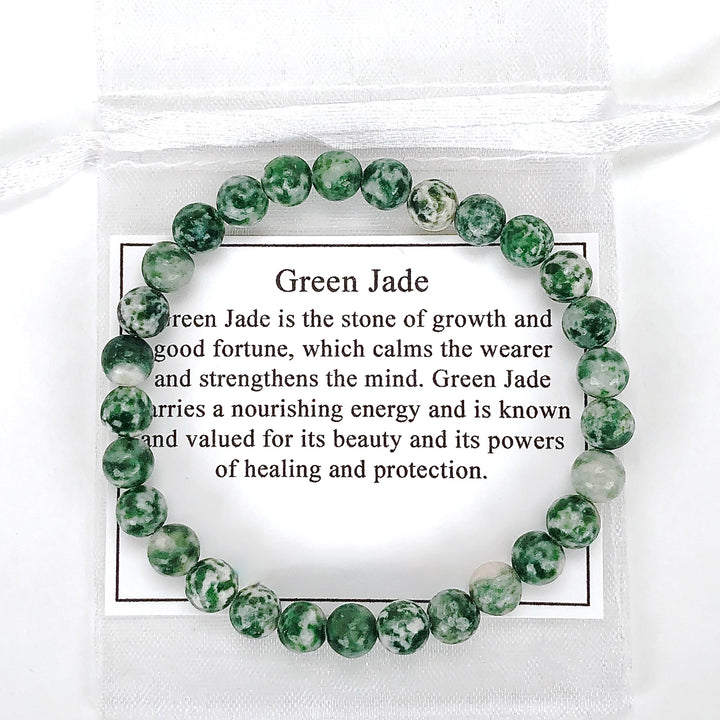 Natural Green Jade 6mm Beaded Gemstone Bracelet with a description card.