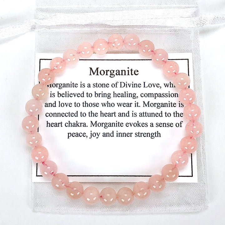 Morganite 6mm Beaded Gemstone Bracelet with a description card.