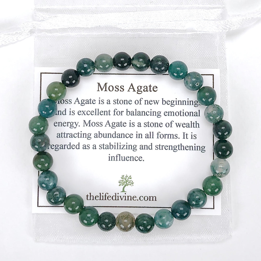 Moss Agate 6mm Beaded Gemstone Bracelet with a description card.