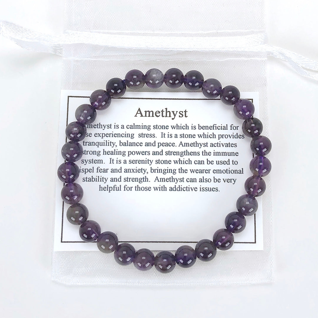 Amethyst 6mm Beaded Gemstone Bracelet with a description card