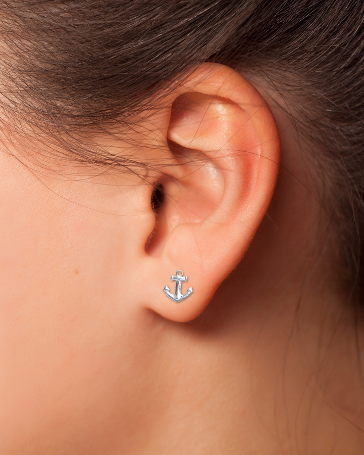 Anchor Sterling Silver Stud Earrings on a ear.