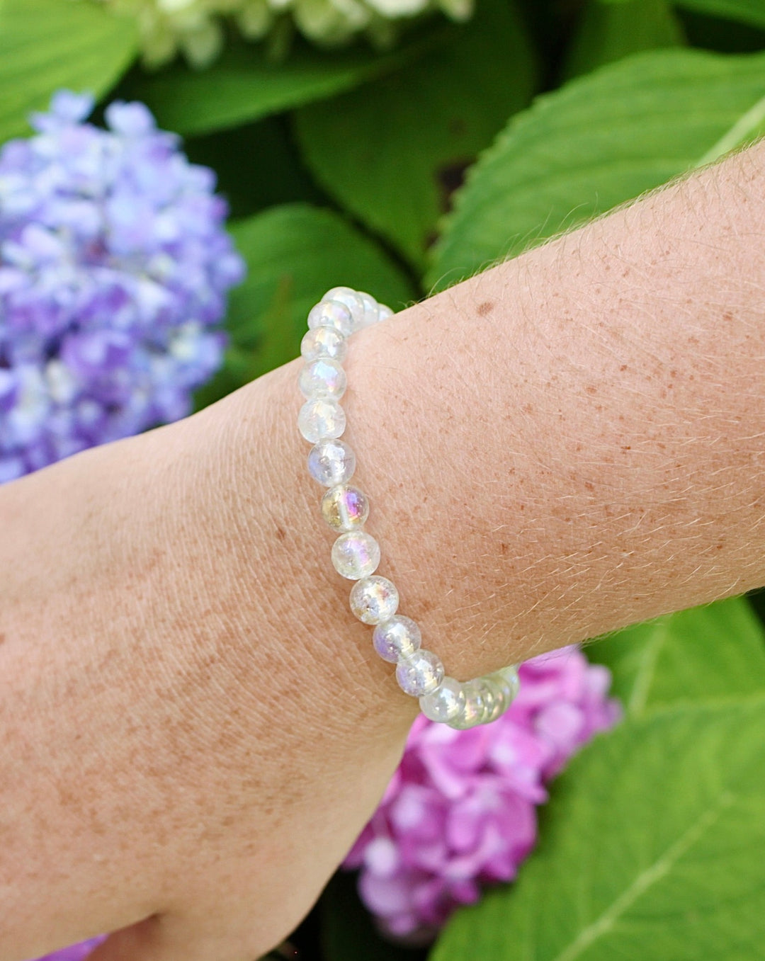 Angel Aura 6mm Beaded Gemstone Bracelet on a wrist