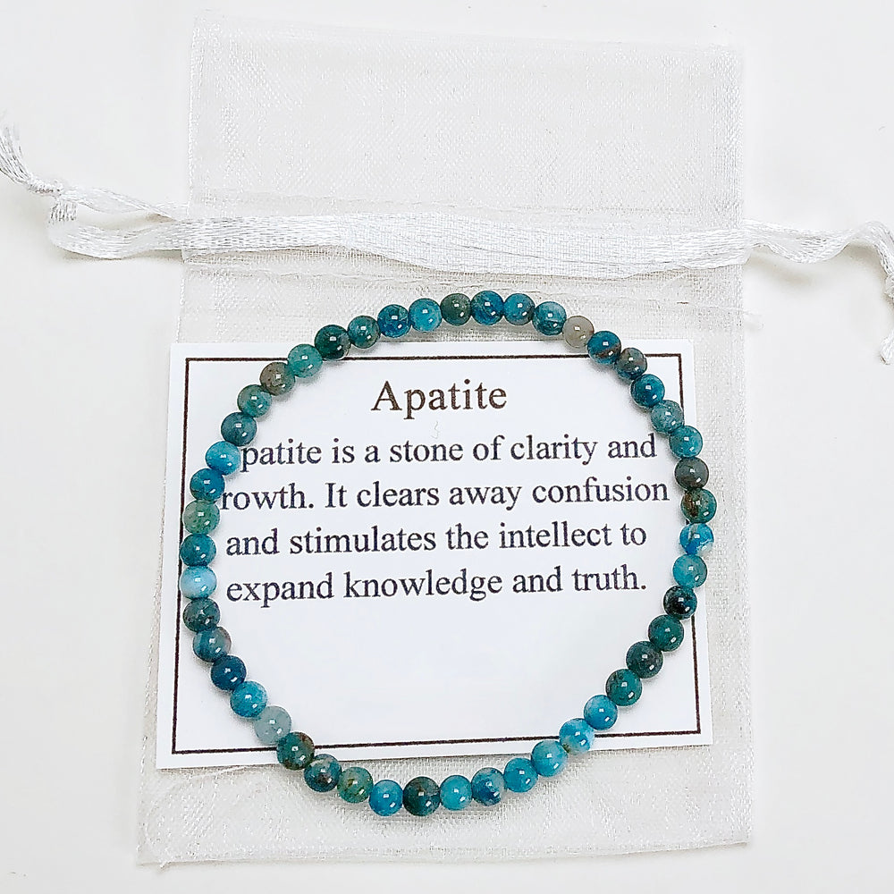 Men's Apatite 4mm Beaded Gemstone Bracelet with a description card.