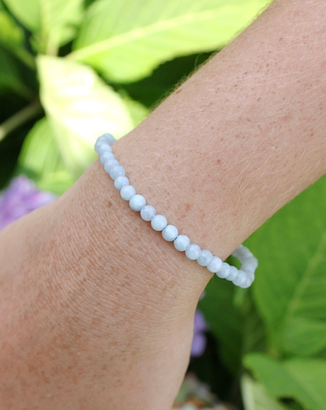 Aquamarine 4mm Beaded Bracelet on a women's wrist