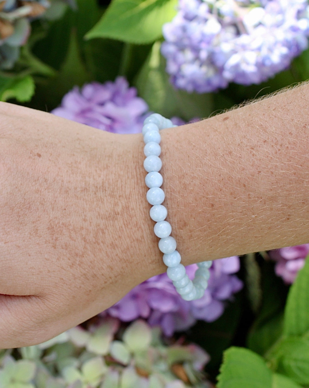 Aquamarine 6mm Gemstone Bracelet on a wrist