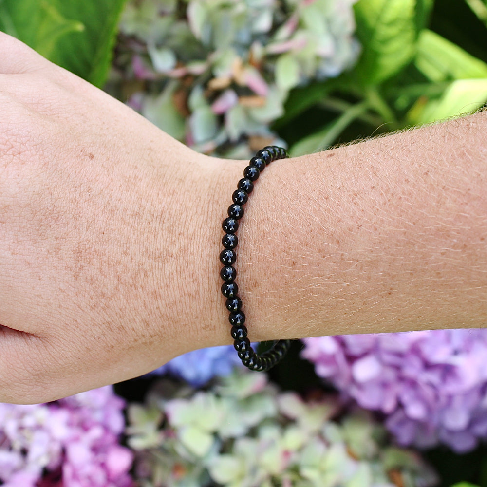 Black Agate 4mm Beaded Gemstone Bracelet  on a Wrist