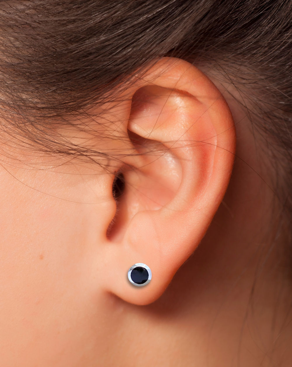 Black Agate Stud Earrings on an Ear.