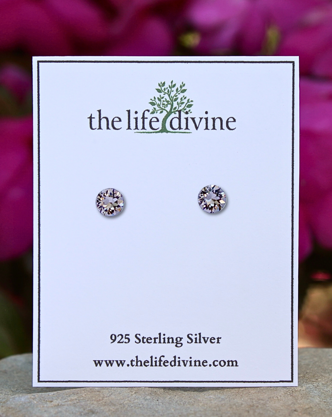 Black Diamond CZ Sterling Silver Stud Earrings on a card.