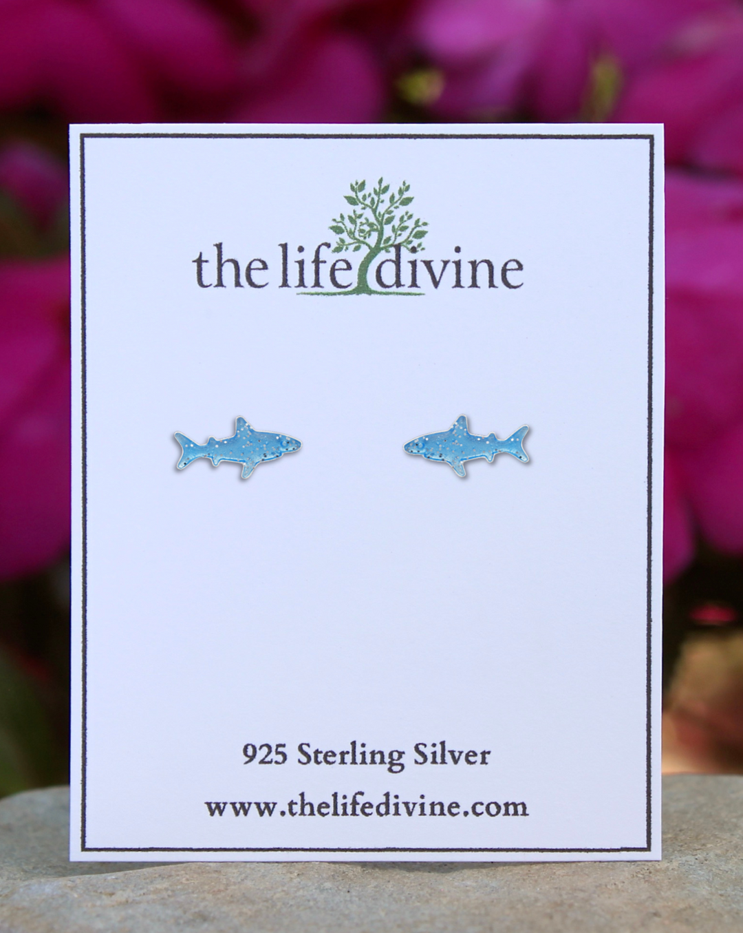 Blue Shark Earrings on card.