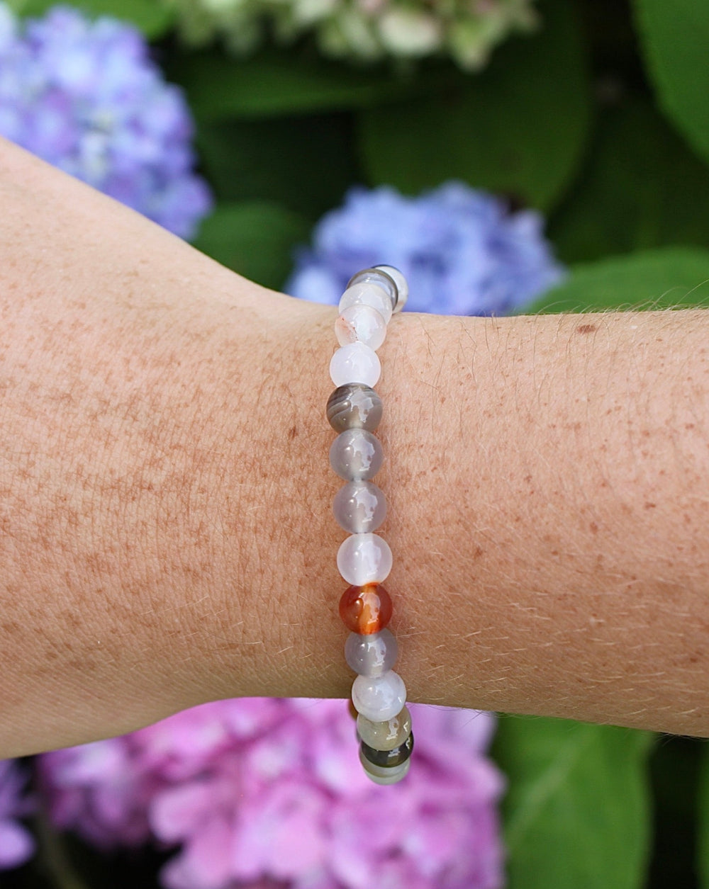 Botswana Agate 6mm Beaded Gemstone Bracelet on a wrist