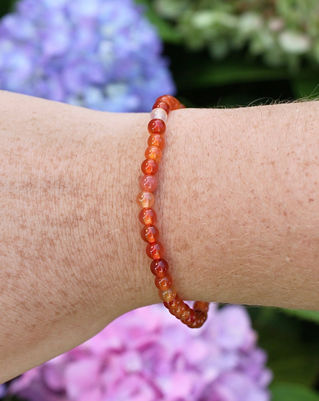 Carnelian 4mm Gemstone Bracelet on a Wrist