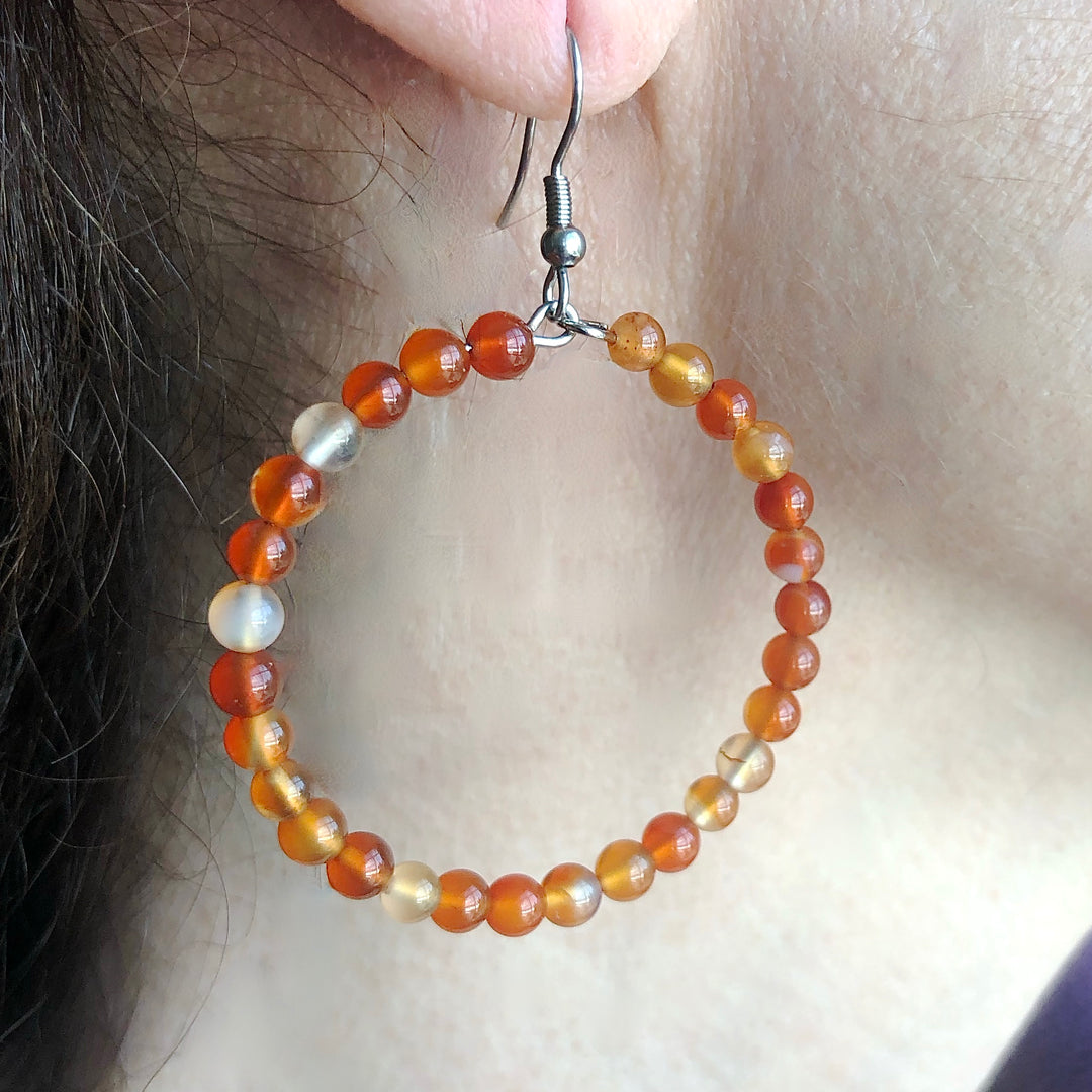 Carnelian Gemstone Earring on an ear