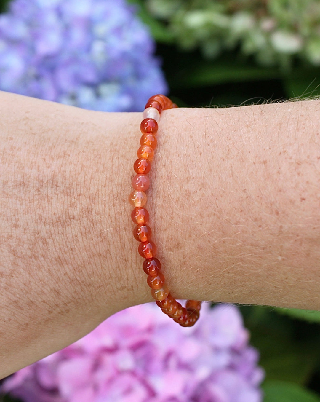 Children's Carnelian 4mm Gemstone Bracelet on a Wrist