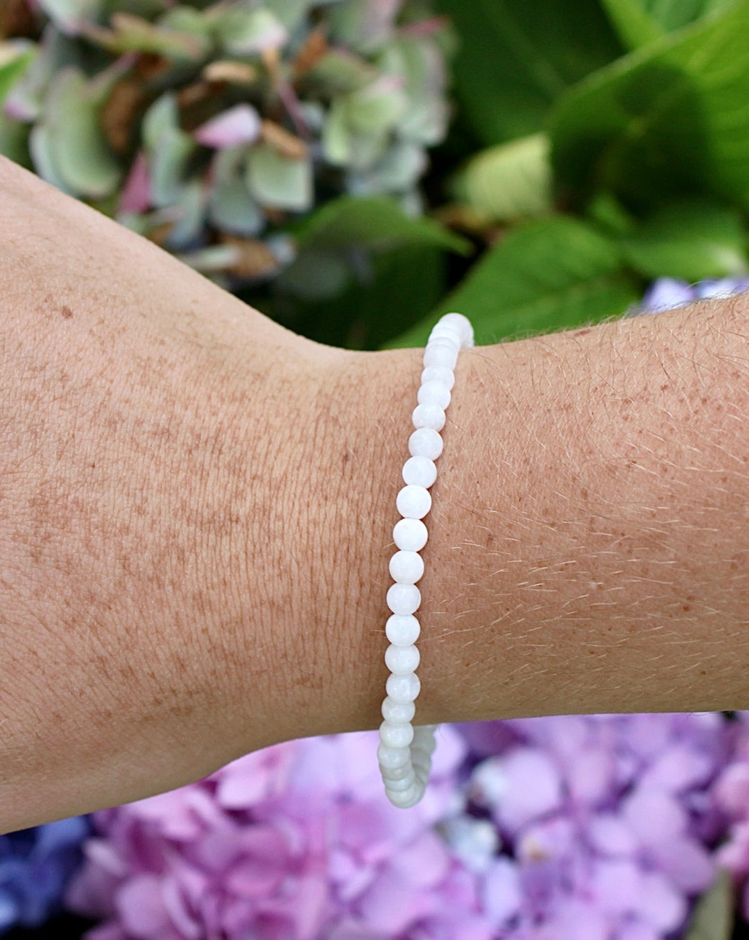 Children's Moonstone 4mm Gemstone Bracelet on a wrist