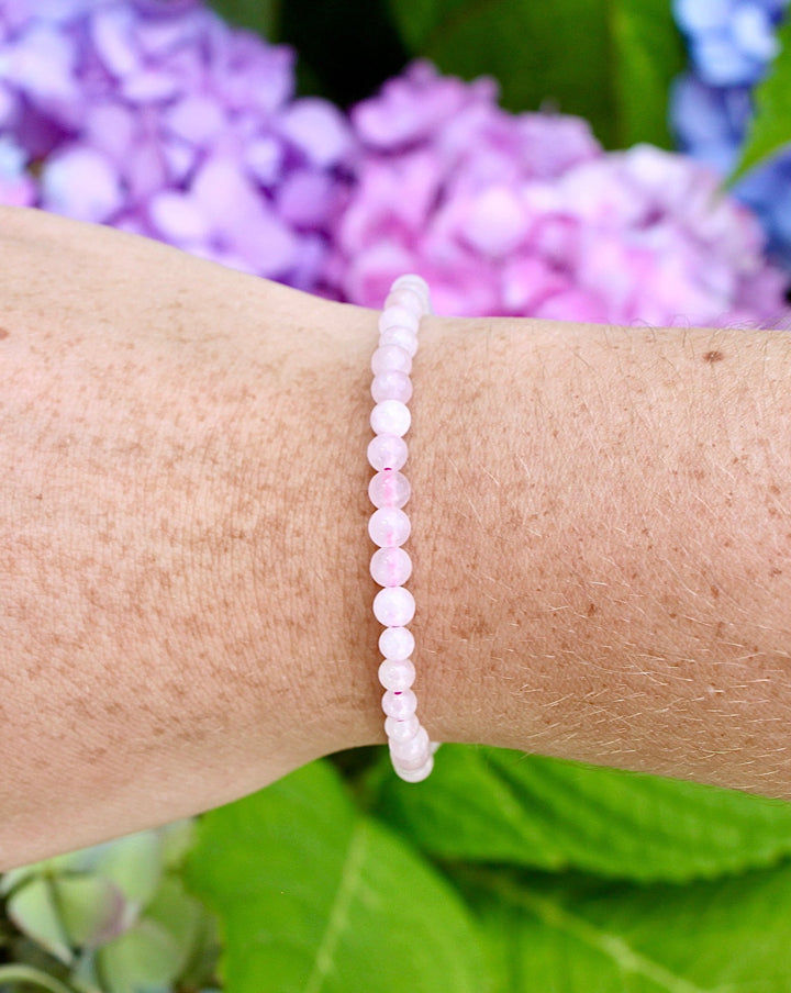 Children's Rose Quartz 4mm Gemstone Bracelet on a wrist