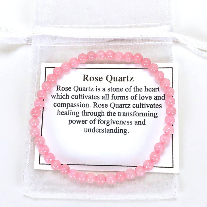 Children's Rose Quartz 4mm Gemstone Bracelet with a description card