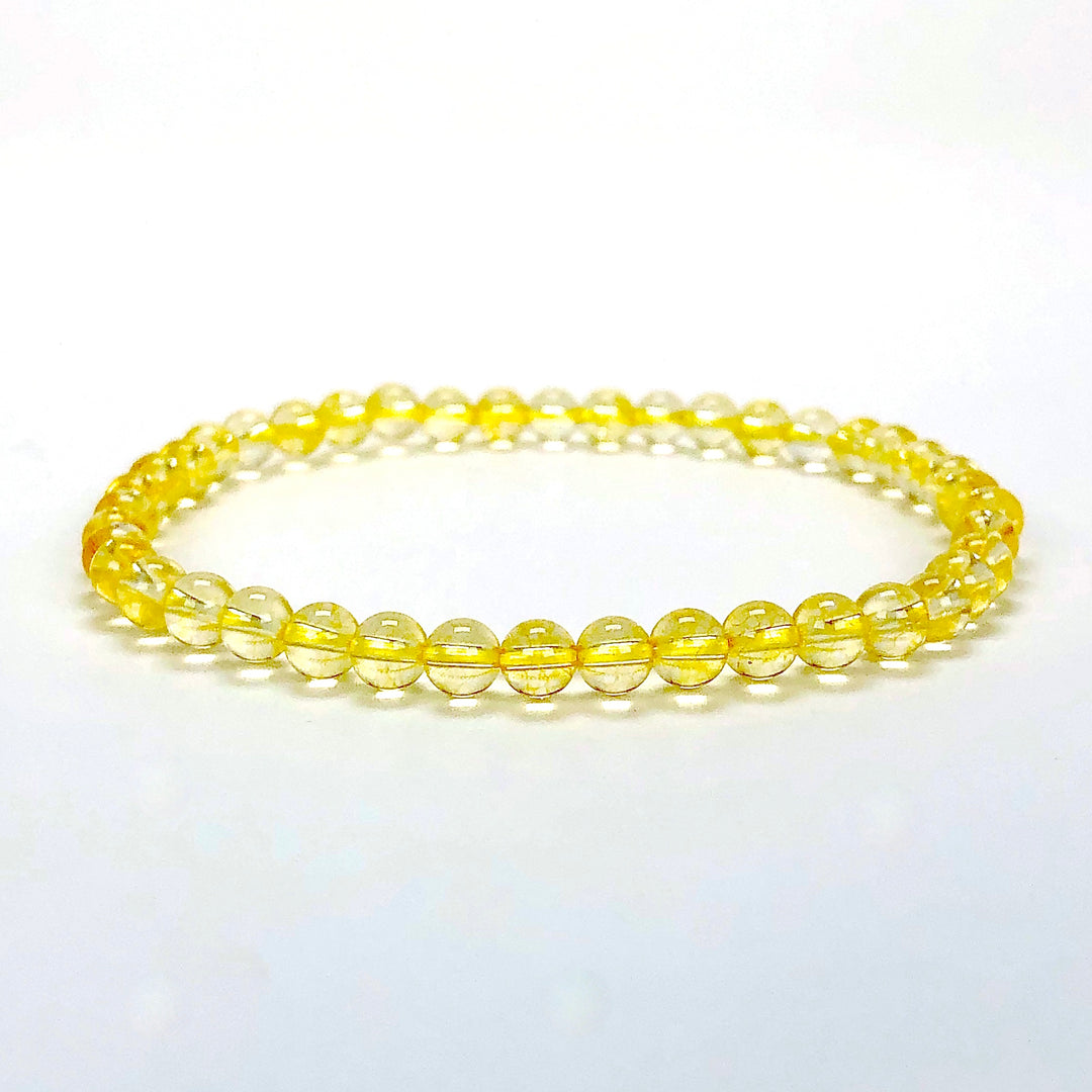 Citrine 4mm Gemstone Bracelet on a white background