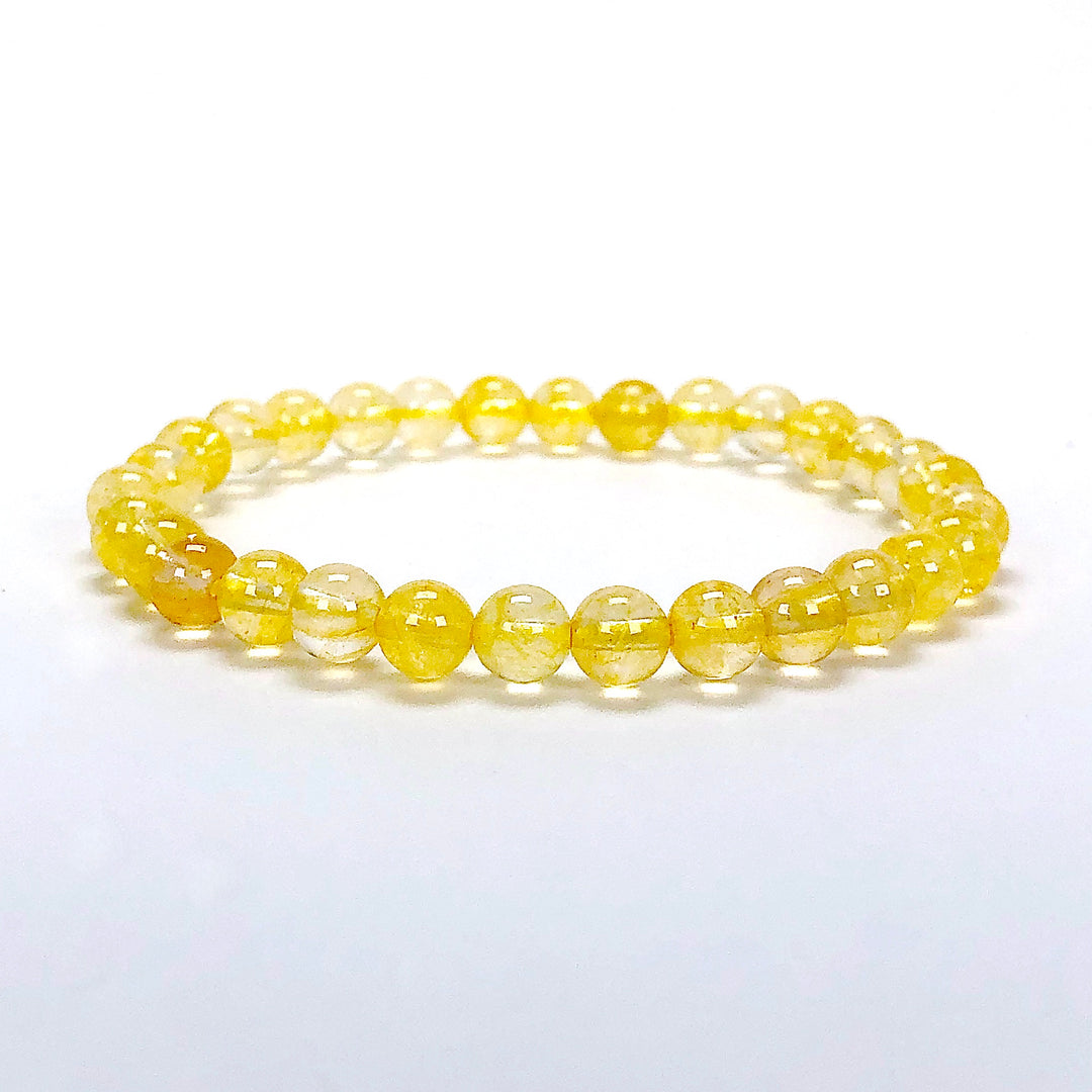 Citrine 6mm Beaded Gemstone Bracelet on a white background.