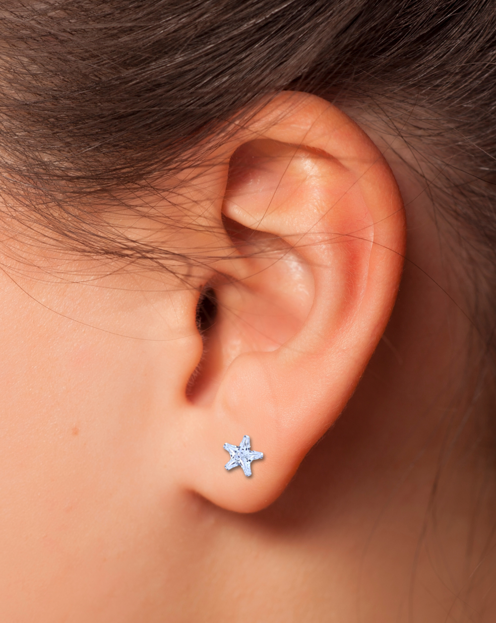  Clear CZ Star Stud Earrings on ear