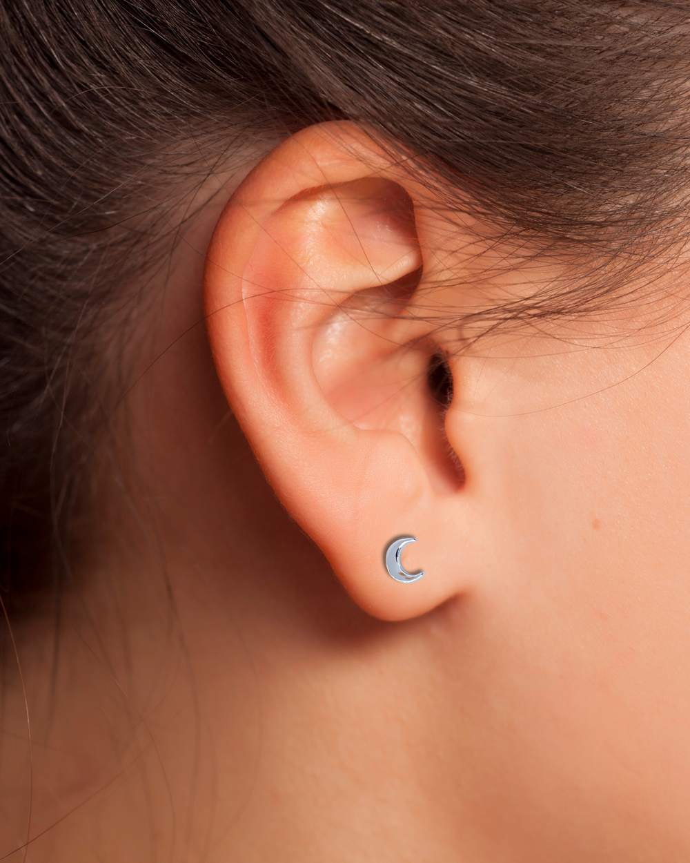 Crescent Moon Stud Earrings on ear