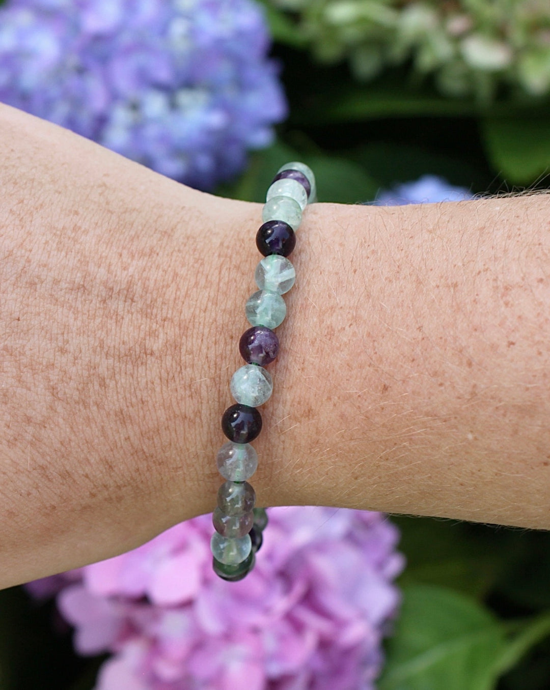 Fluorite 6mm Beaded Gemstone Bracelet on a wrist