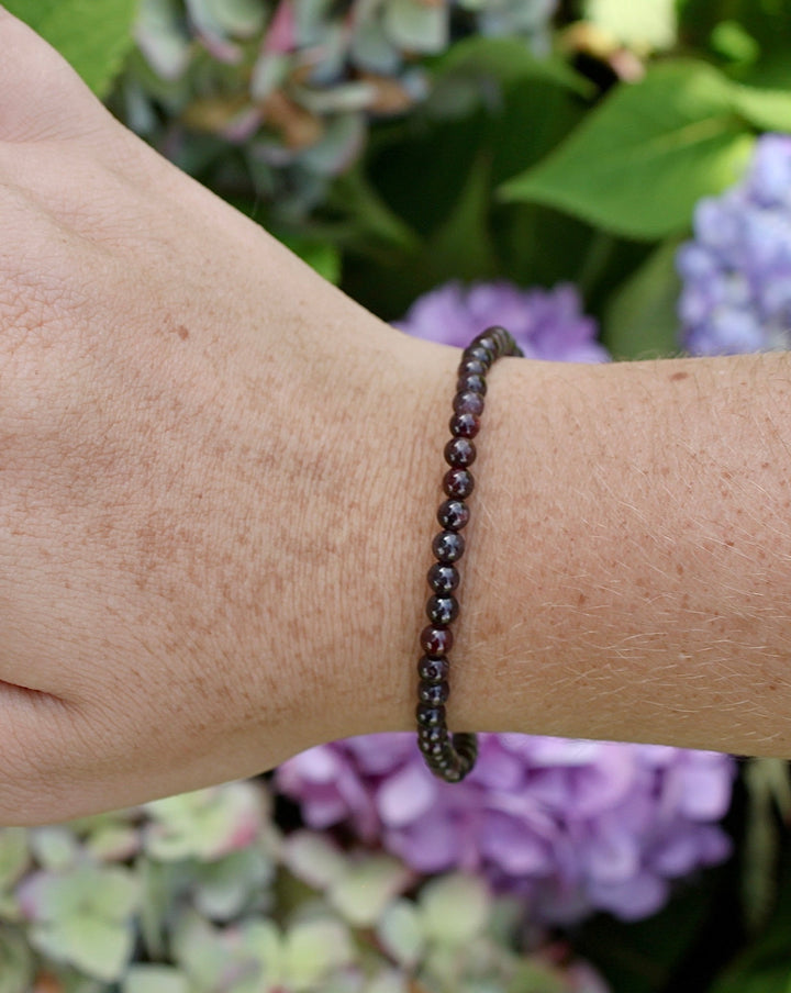 Children's Garnet 4mm Gemstone Bracelet on a Wrist