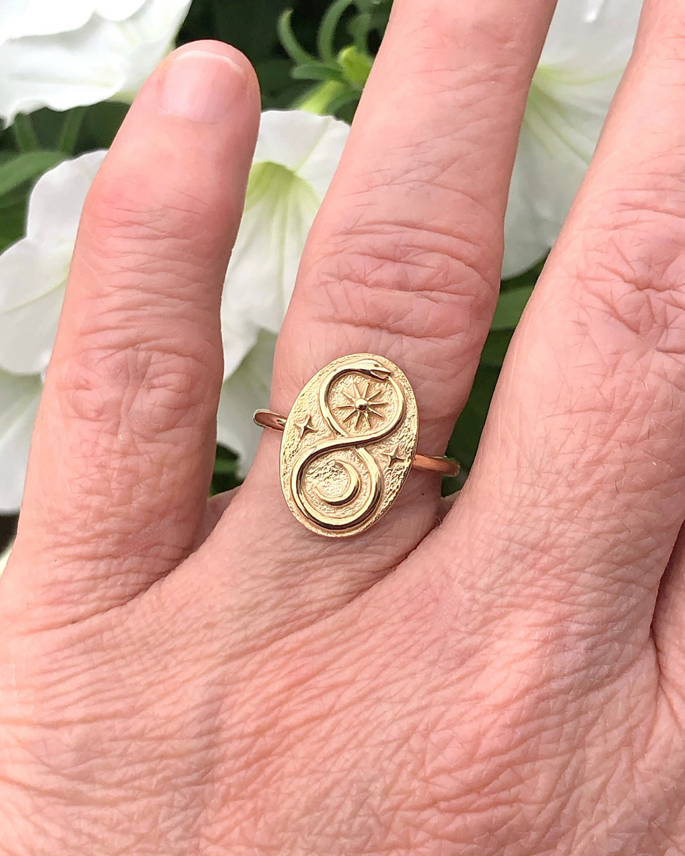 Bronze Ouroboros Ring on finger