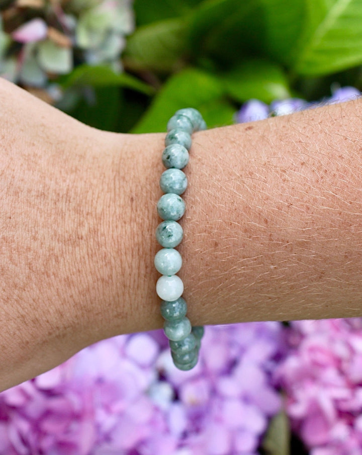 Jadeite 6mm Beaded Gemstone Bracelet on a wrist