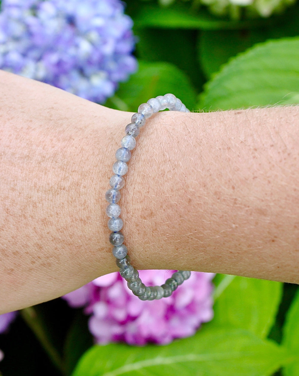 Labradorite 4mm Beaded Gemstone Bracelet on a wrist.