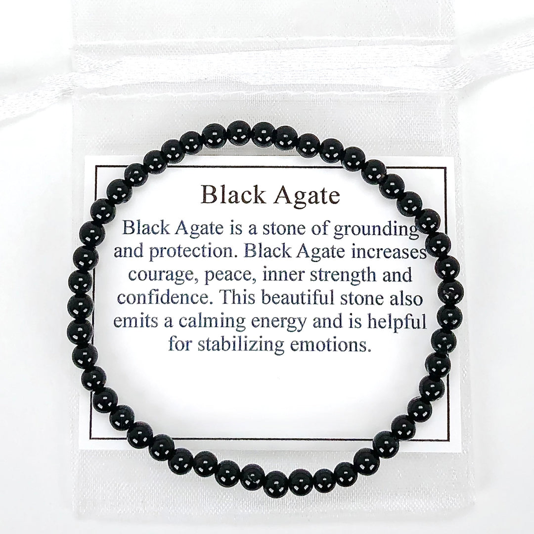 Men's Black Agate 4mm Beaded Gemstone Bracelet with a description card.