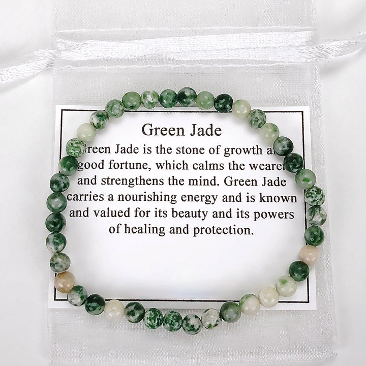 Men's Natural Green Jade 4mm Beaded Gemstone Bracelet with a description card.