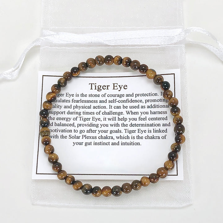 Men's Tiger Eye 4mm Beaded Gemstone Bracelet with a description card.