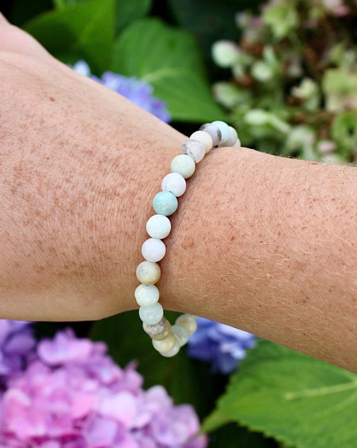 Multi Amazonite 6mm Beaded Gemstone Bracelet on a wrist.