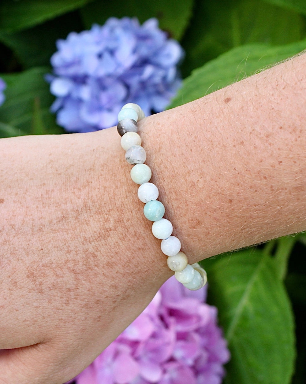 Multi Amazonite 6mm Beaded Gemstone Bracelet on a wrist.