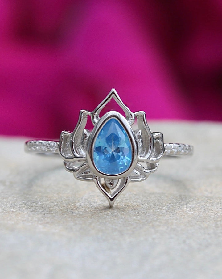 Silver Lotus Flower Ring with Blue Topaz