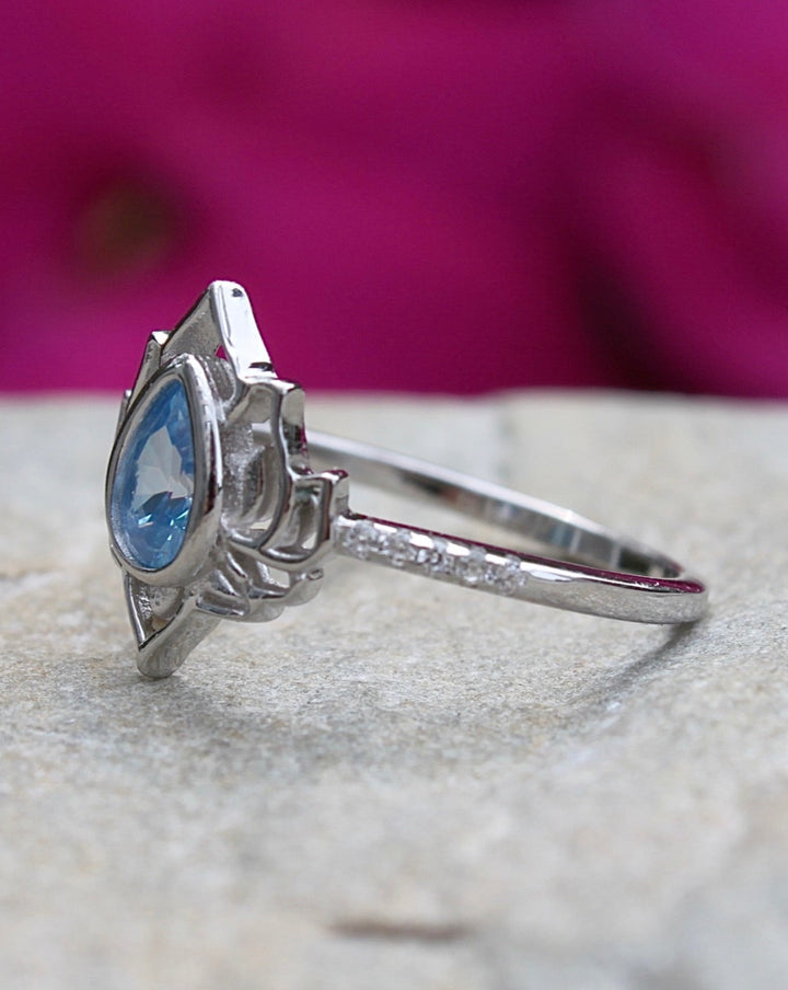 Silver Lotus Flower Ring with Blue Topaz