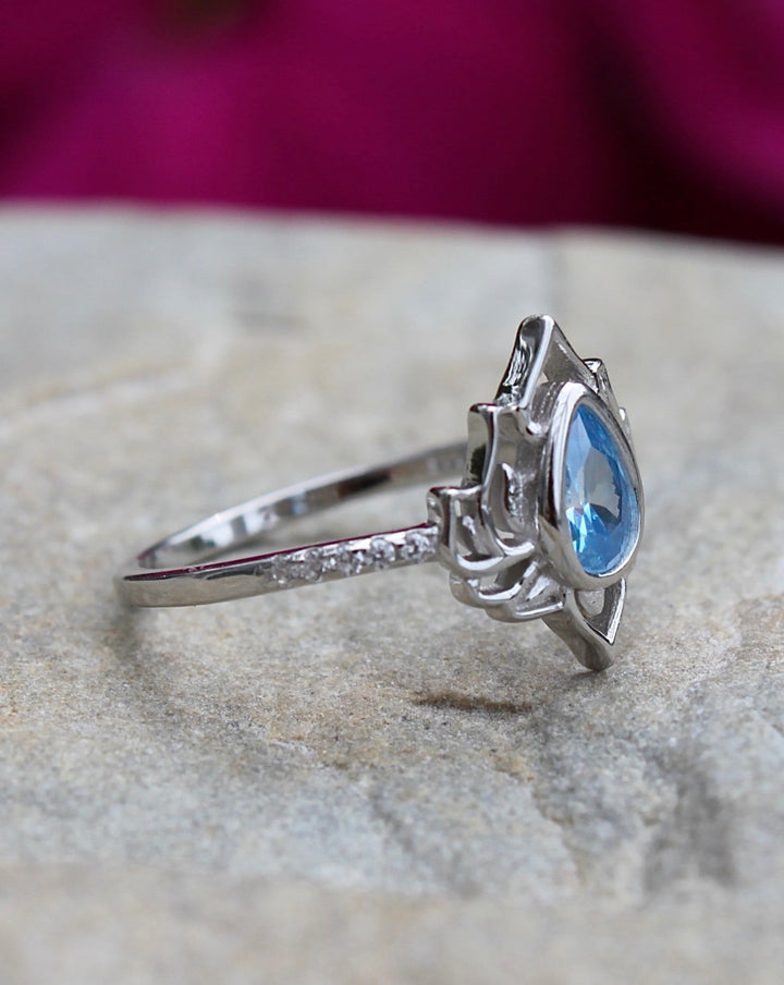 Silver Lotus Flower Ring with Blue Topaz