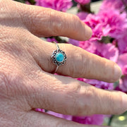 Sterling Silver Turquoise Lotus Flower Ring  on a finger