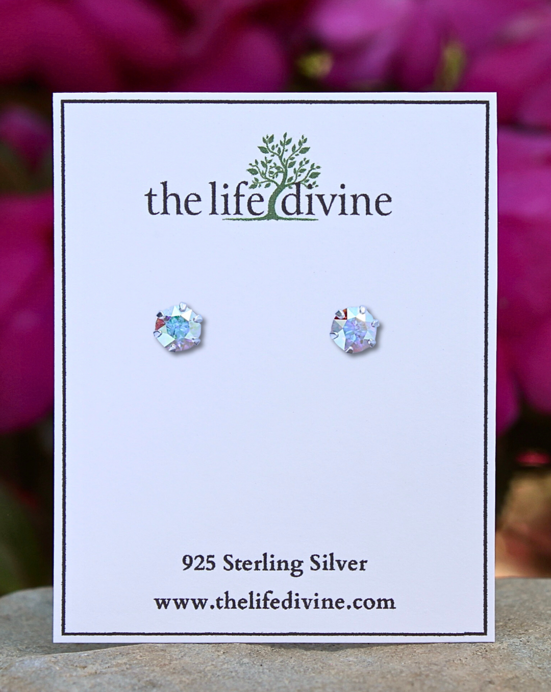 Round AB Crystal CZ Silver Earrings on a card.