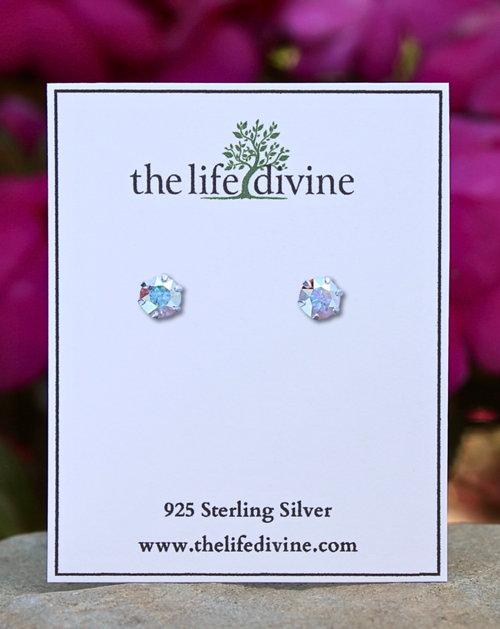 Round AB Topaz CZ Silver Earrings on a card.