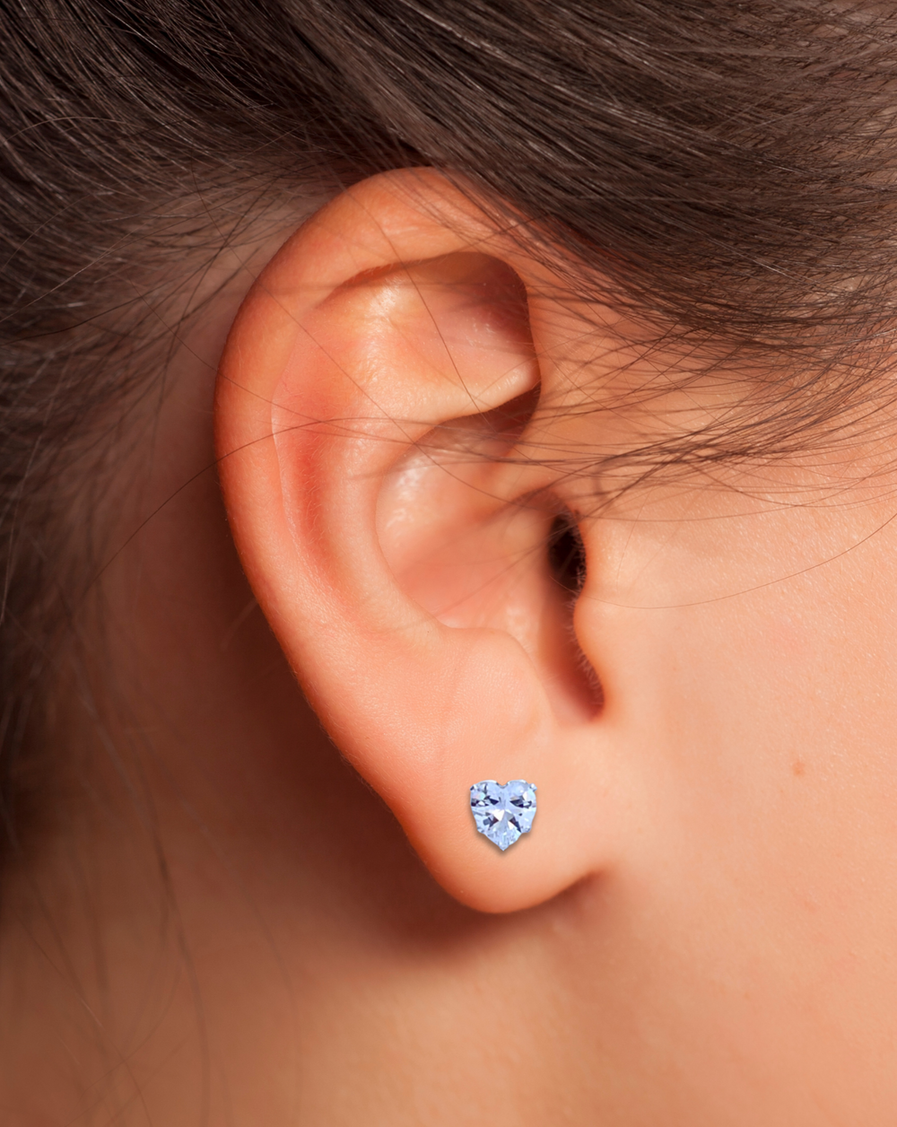 Sterling Silver CZ Heart Stud Earrings on ear