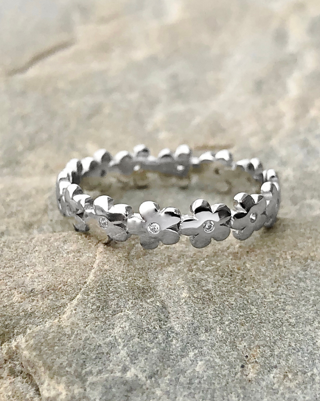 Silver Infinity Flower Ring with CZ Stones