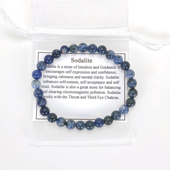 Sodalite 6mm Beaded Gemstone Bracelet with a description card.