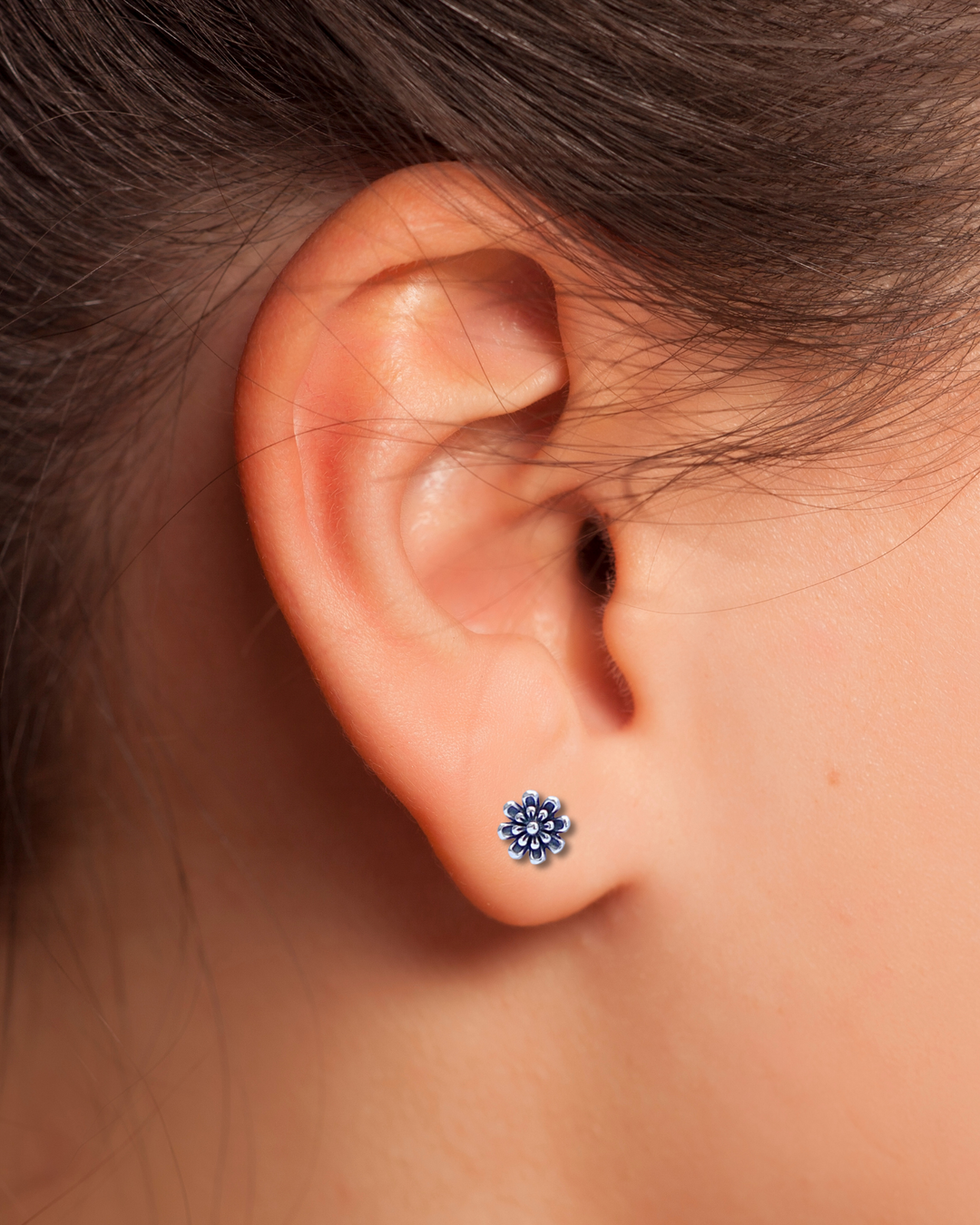 Sterling Silver Flower Stud Earrings in ear
